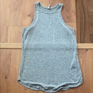 Gray luxespun racer tank with curved hem